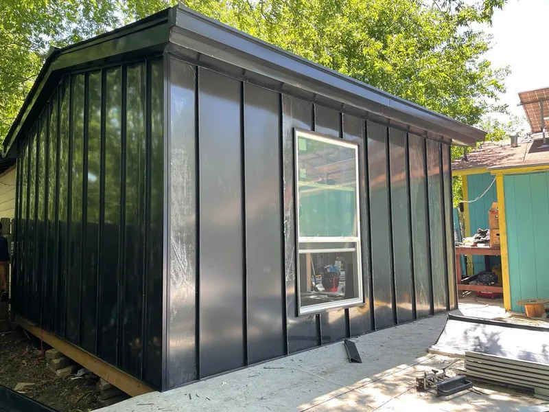 Black standing seam metal wall panels for Metal Roof Installation in White Knoll